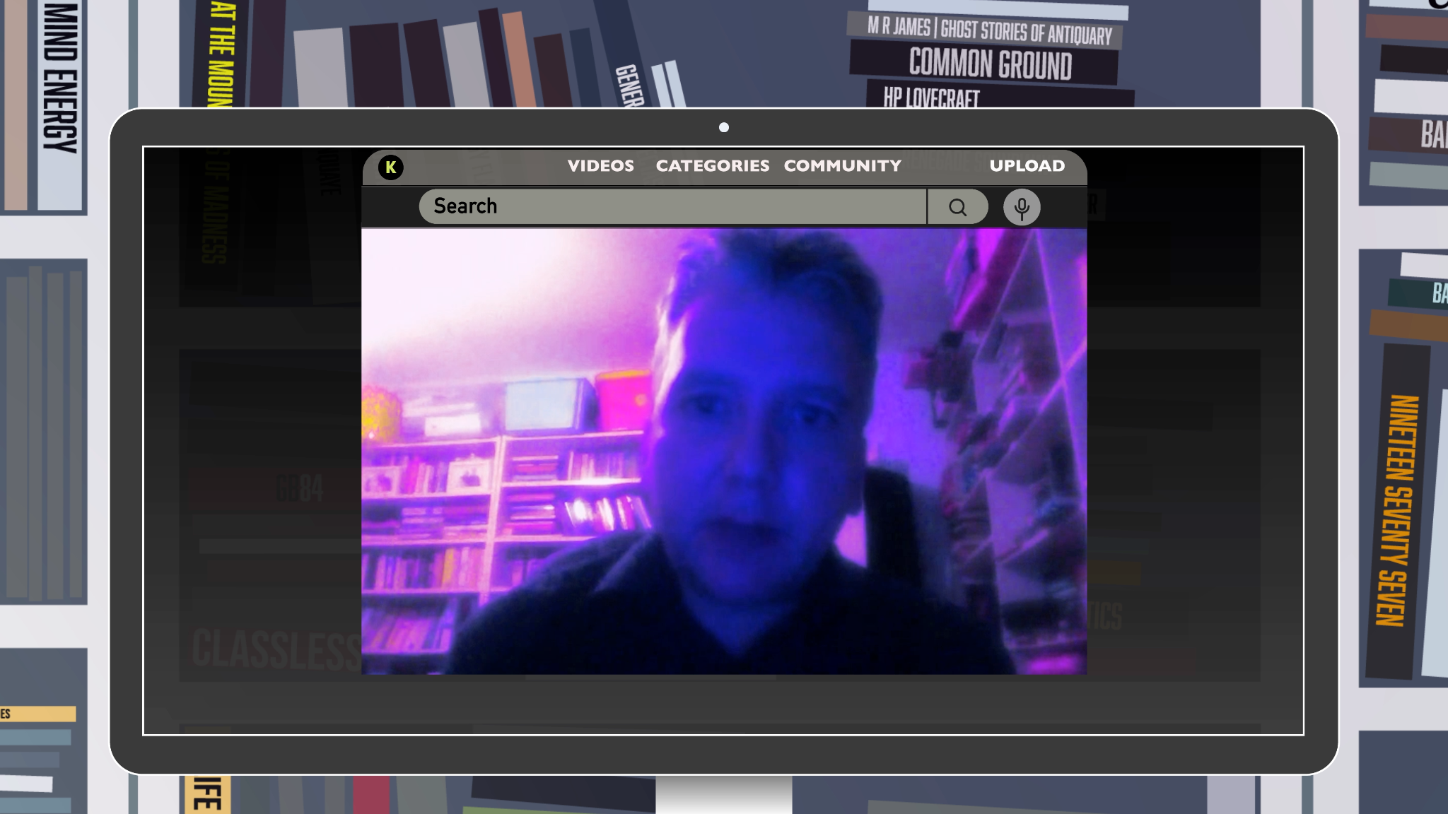 Still from We’re Making a Film About Mark Fisher, showing a speaker on a video screen